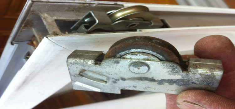 screen door roller repair in West Little River